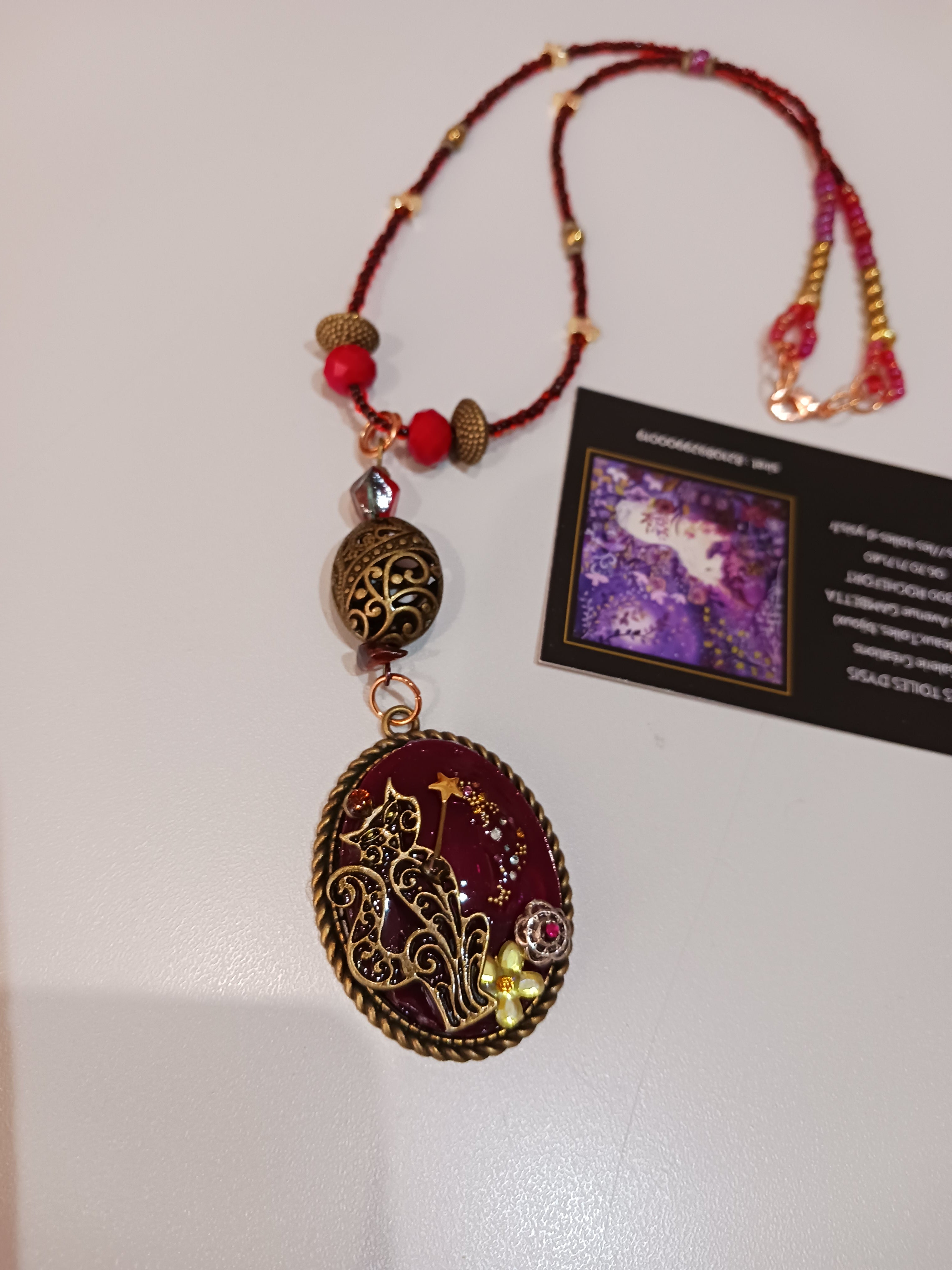 Collier Chat magicien