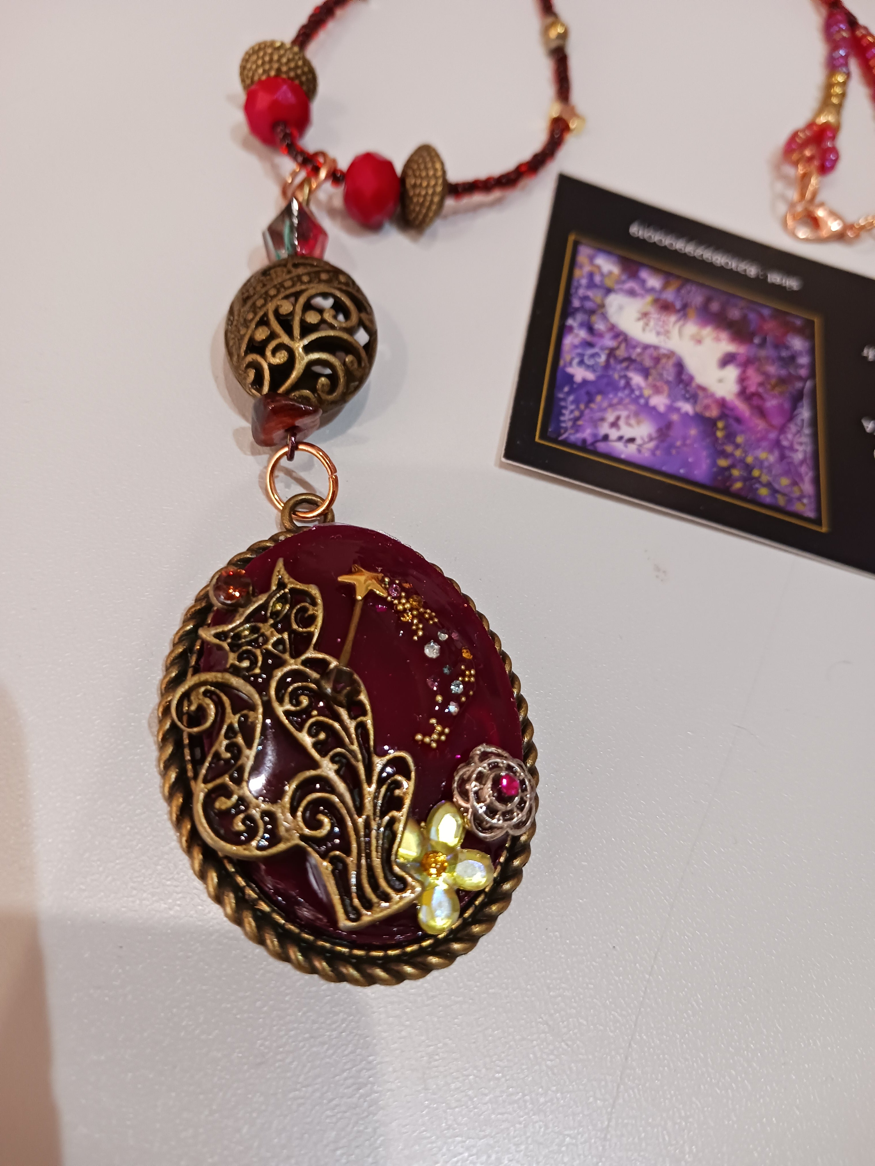 Collier Chat magicien