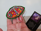 Broche papillon rouge et vert