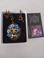 Collier"Petite chouette dans les fleurs"