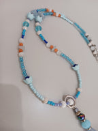 Collier fleurs, bleu blanc orange