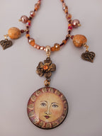 Collier Soleil et coeur