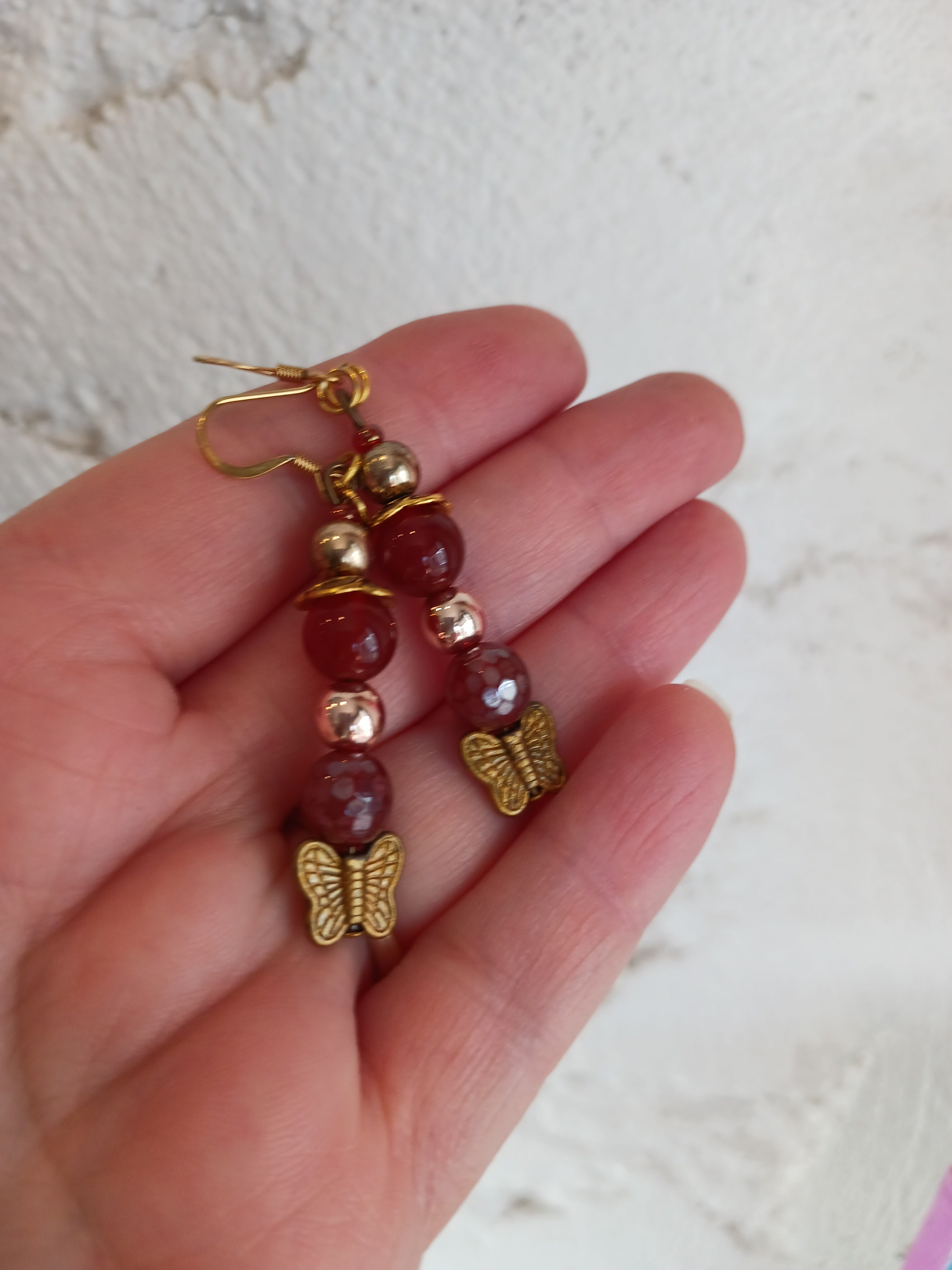 Boucles cornalines et papillons