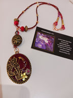 Collier Chat magicien