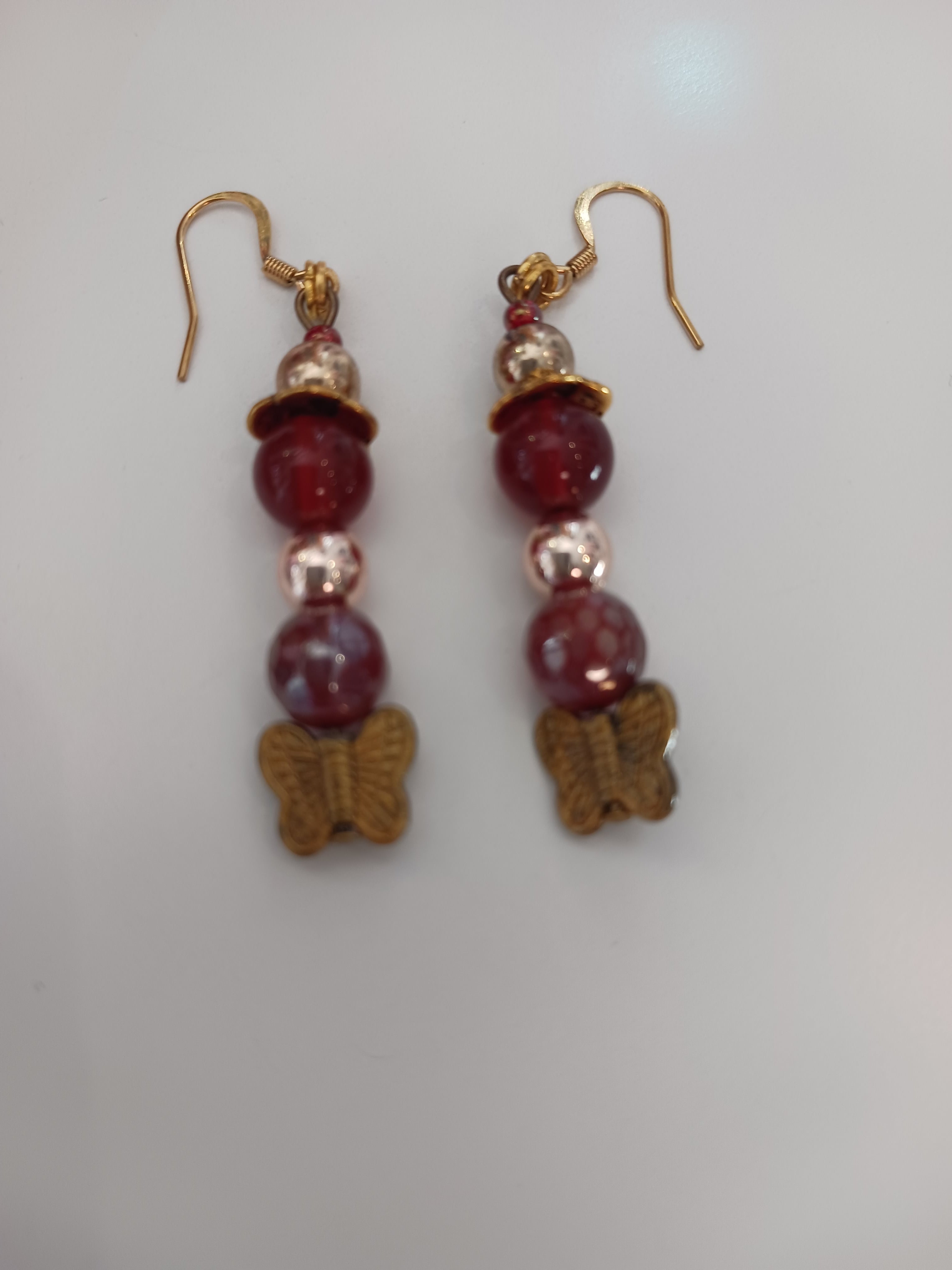 Boucles cornalines et papillons