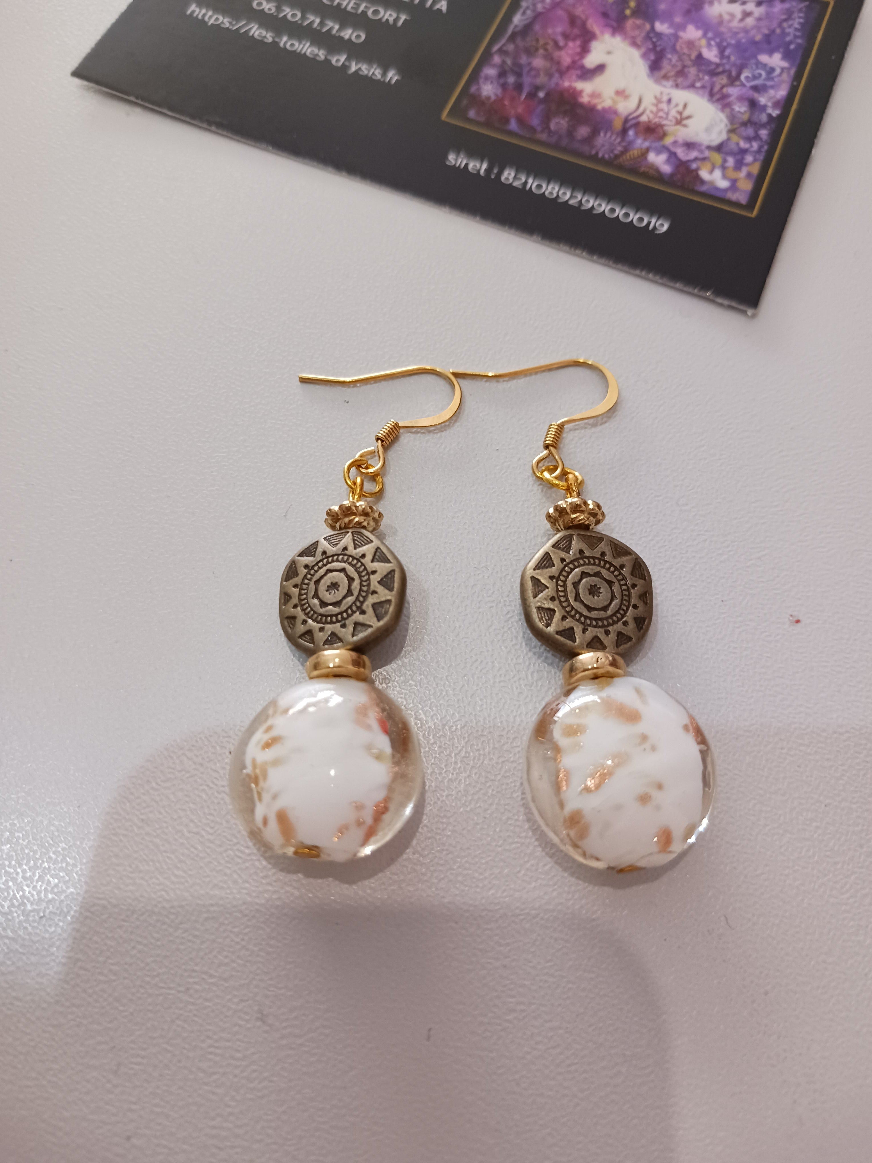 Boucles nacrées d'or