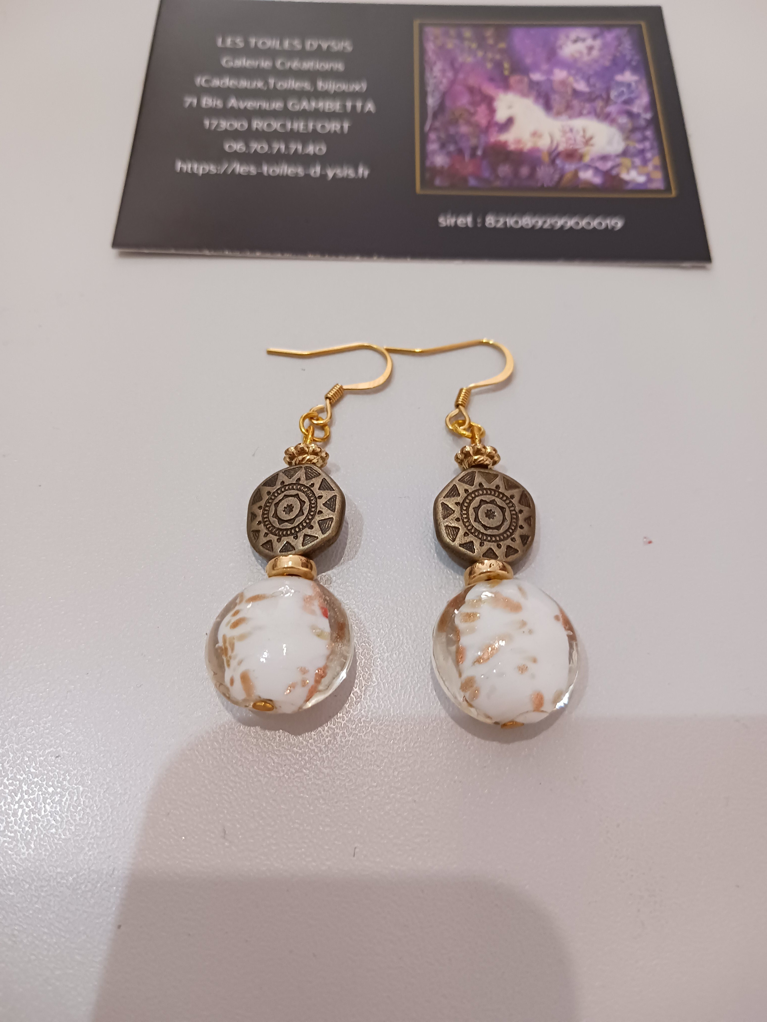 Boucles nacrées d'or