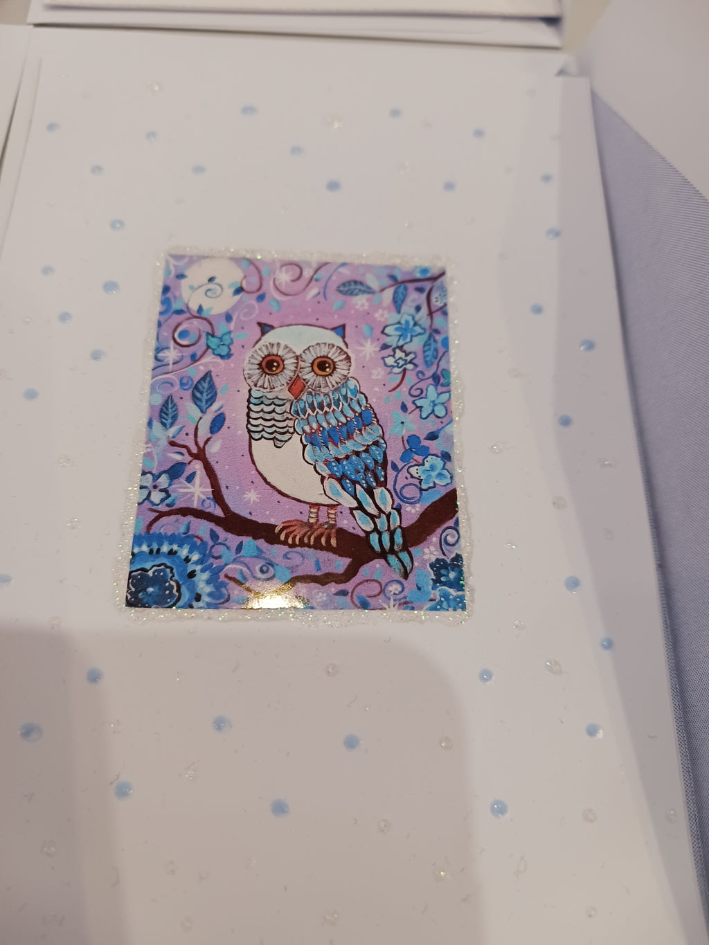 carte postale bleue mauve et marron