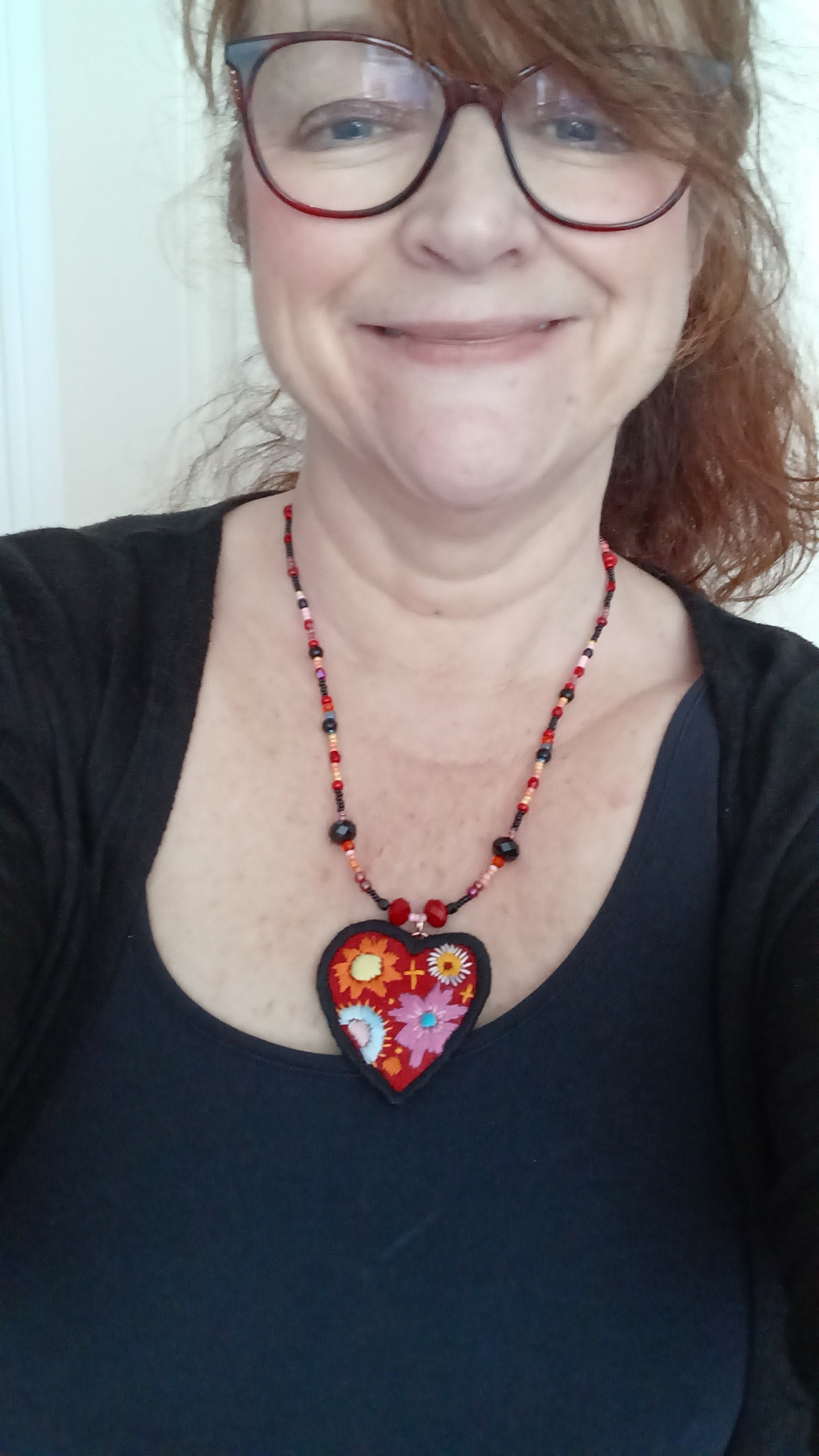 collier coeur porté