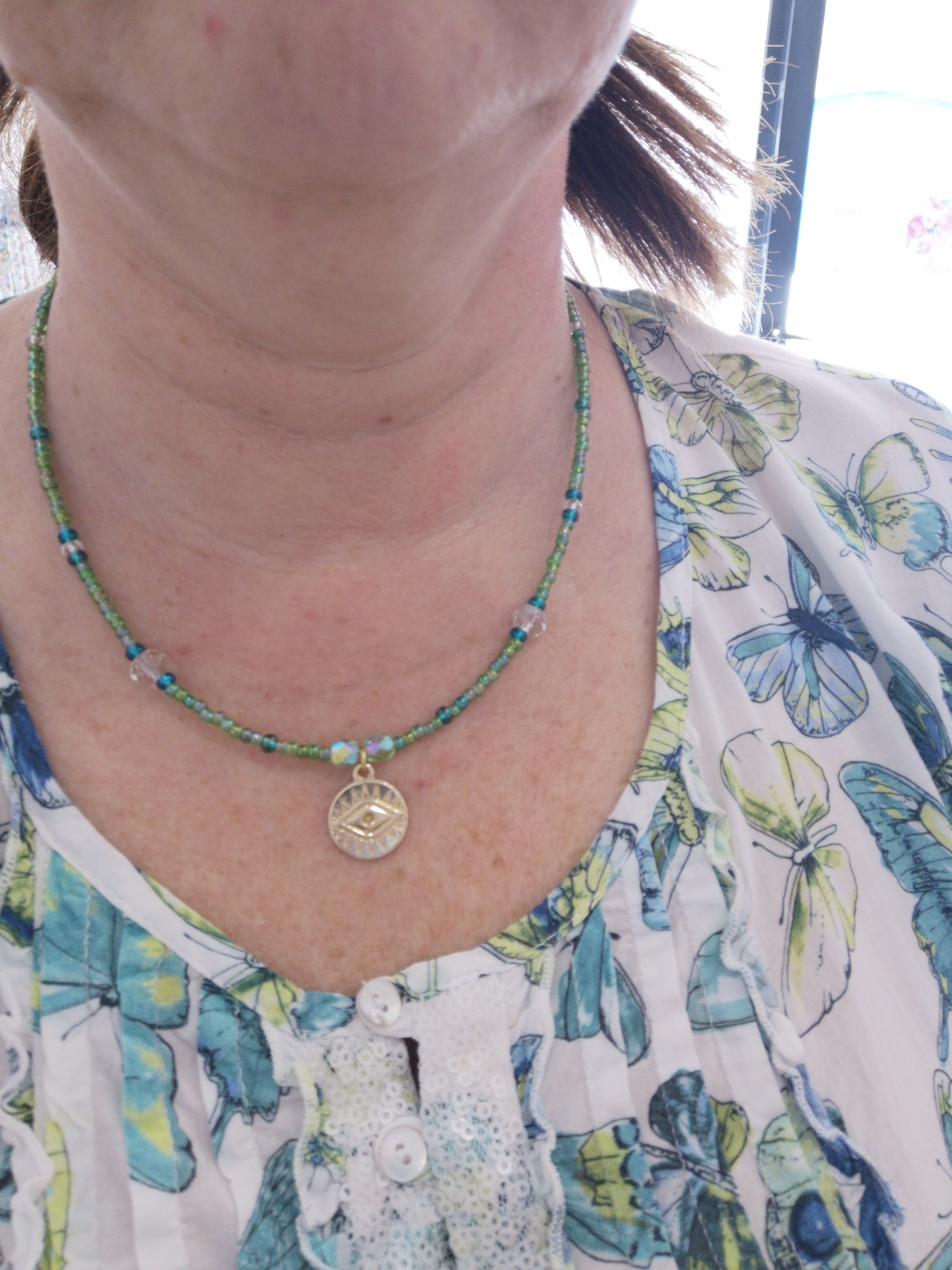 collier vert oeil protecteur